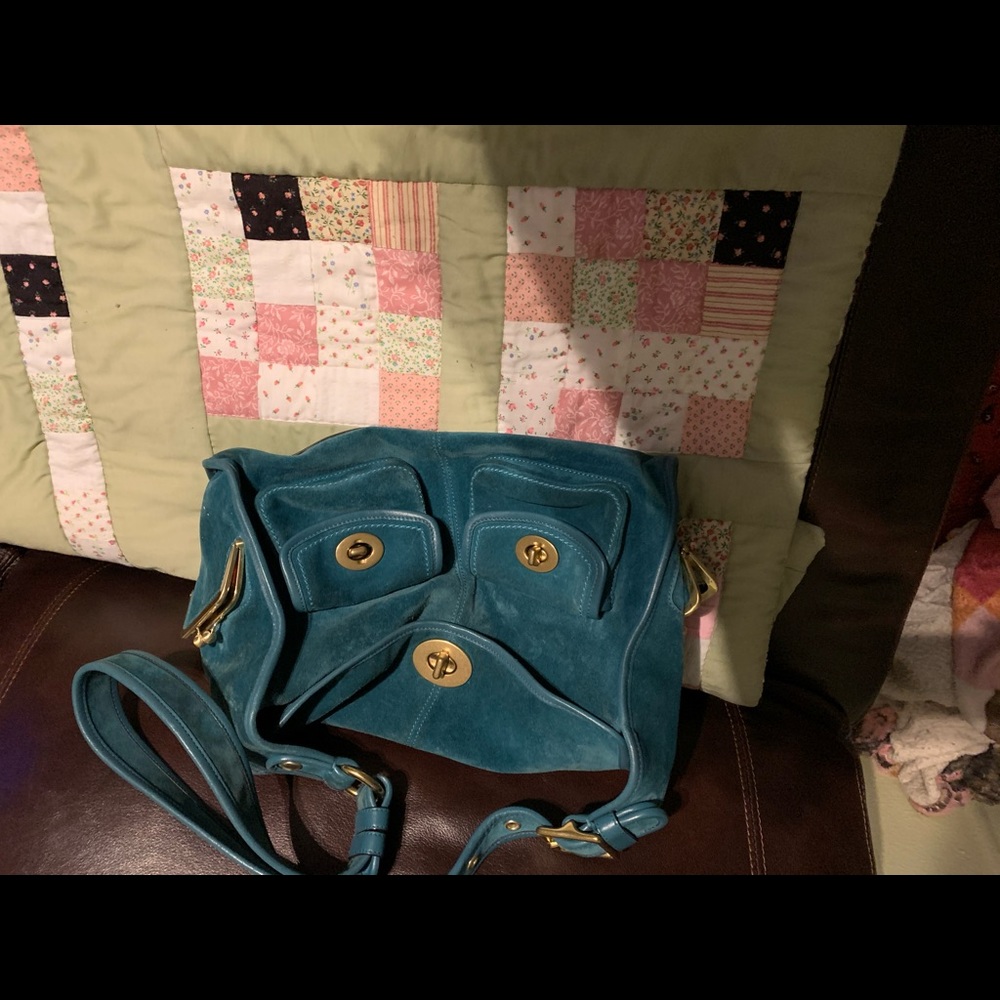 Nice suede turquoise shoulder bag!